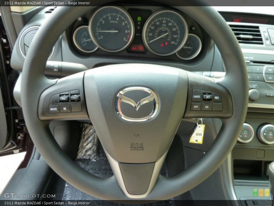 Beige Interior Steering Wheel for the 2011 Mazda MAZDA6 i Sport Sedan #52019464