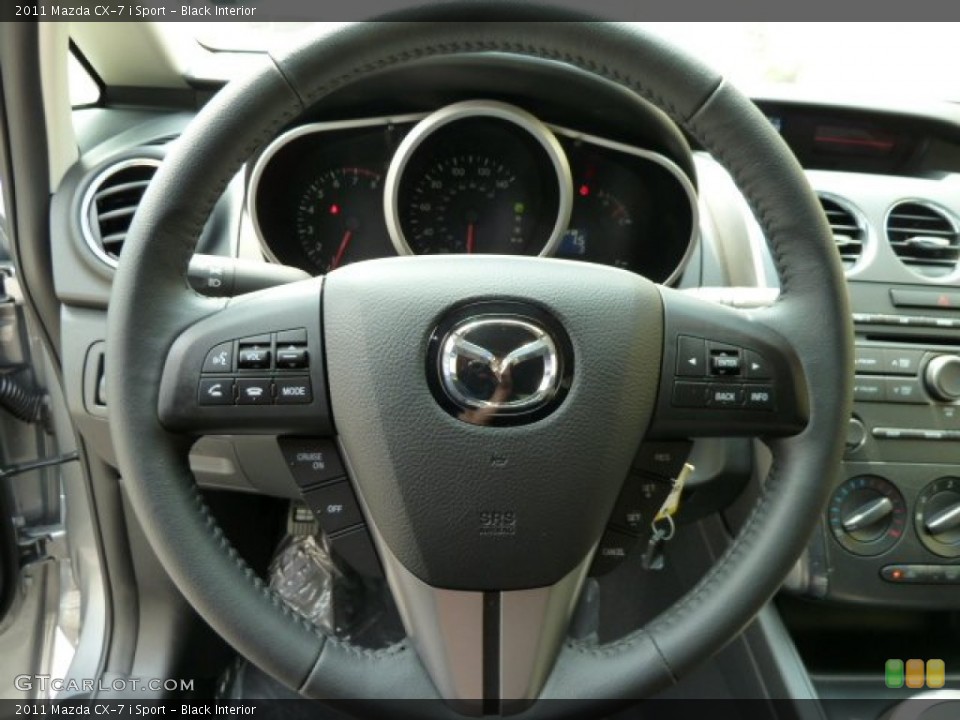 Black Interior Steering Wheel for the 2011 Mazda CX-7 i Sport #52019754