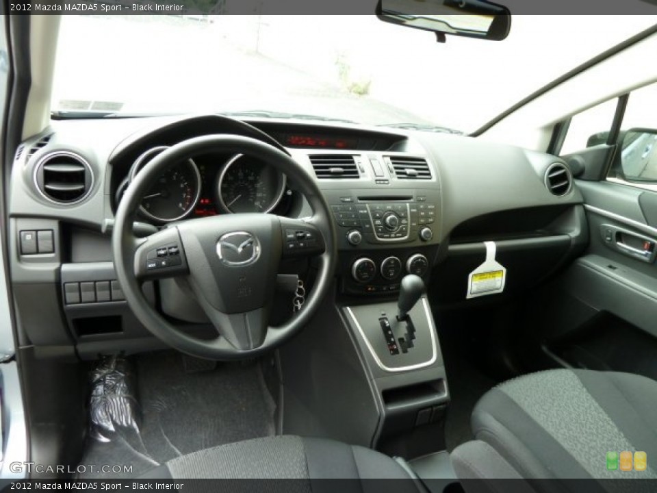 Black Interior Prime Interior for the 2012 Mazda MAZDA5 Sport #52021152