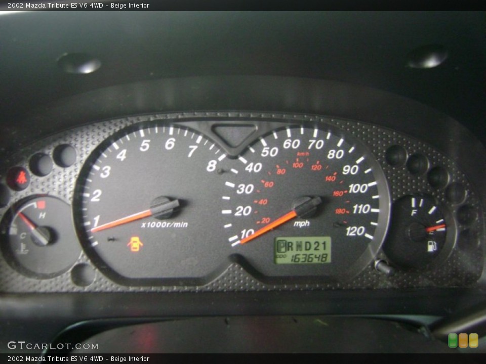 Beige Interior Gauges for the 2002 Mazda Tribute ES V6 4WD #52037397