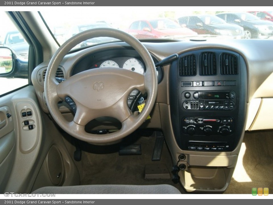 Sandstone Interior Dashboard for the 2001 Dodge Grand Caravan Sport #52048976