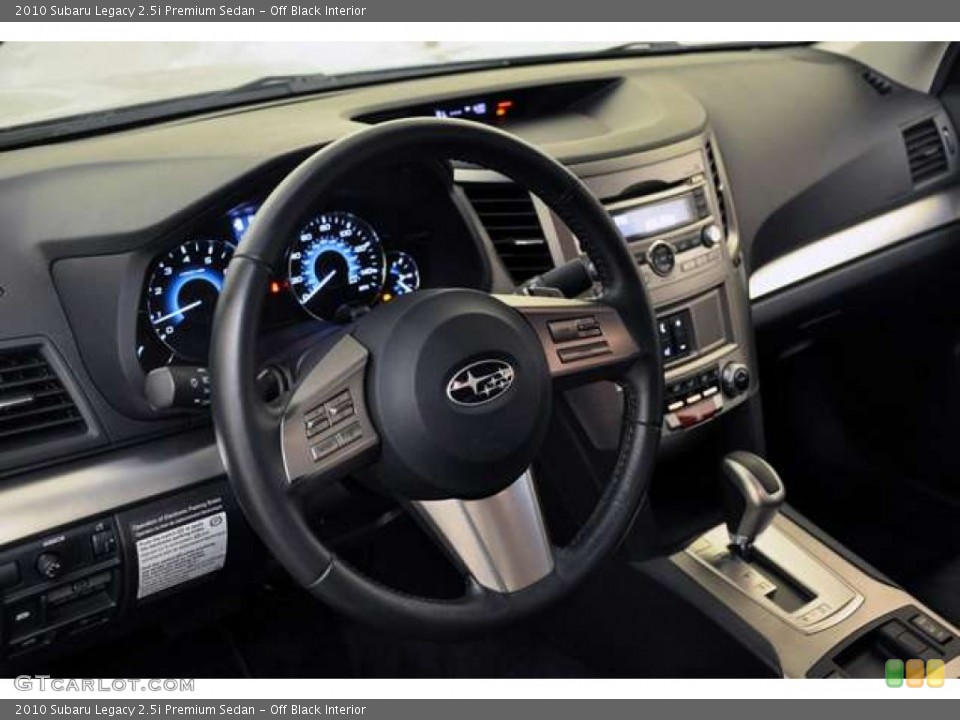 Off Black Interior Dashboard for the 2010 Subaru Legacy 2.5i Premium Sedan #52070174