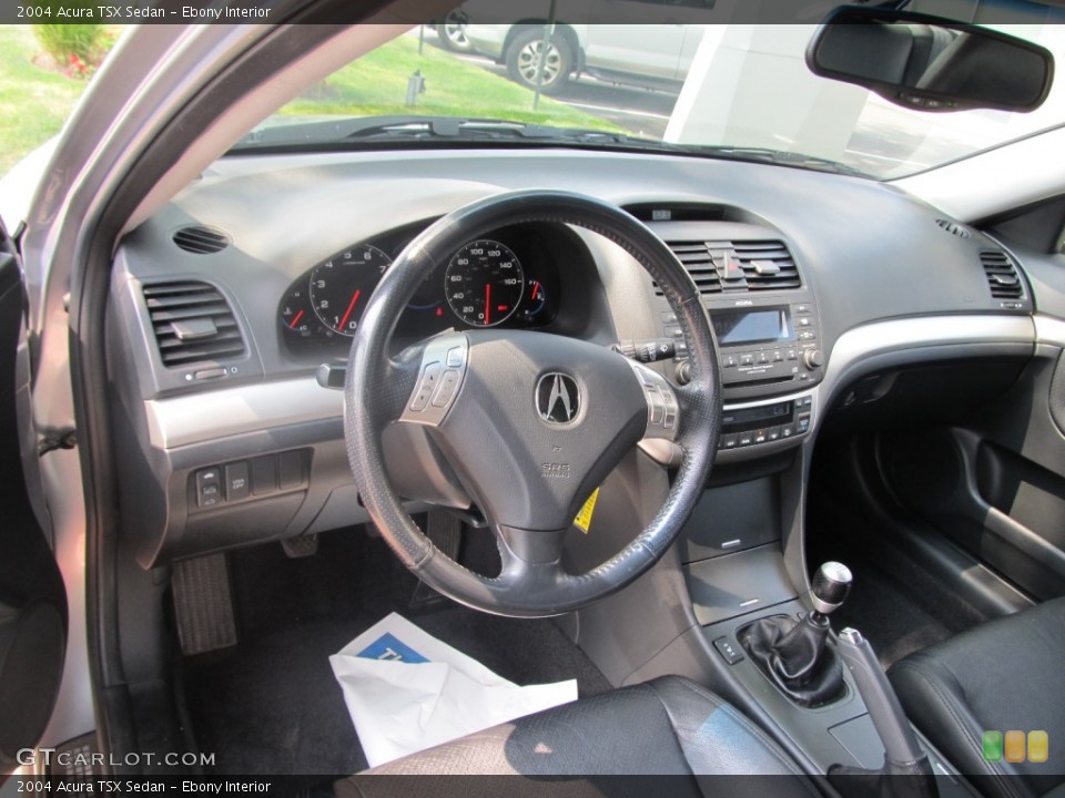 Ebony Interior Dashboard for the 2004 Acura TSX Sedan #52084364