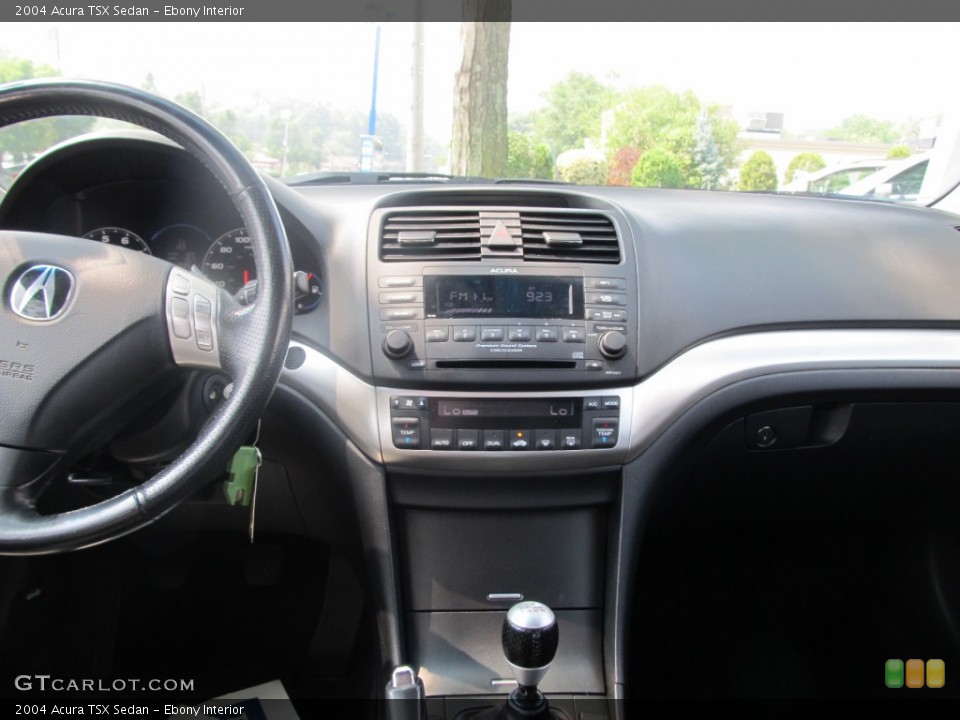 Ebony Interior Dashboard for the 2004 Acura TSX Sedan #52084379
