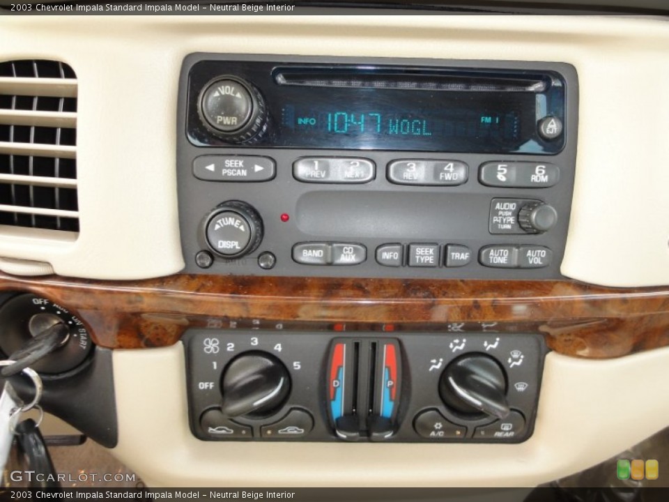 Neutral Beige Interior Controls for the 2003 Chevrolet Impala  #52094708