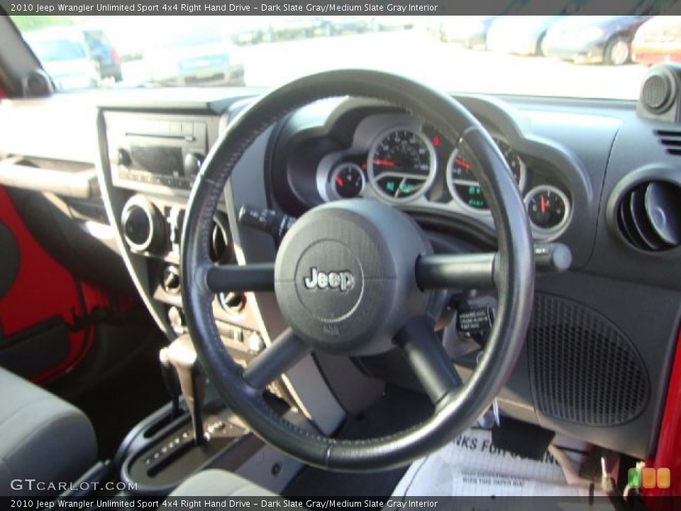 Dark Slate Gray/Medium Slate Gray Interior Steering Wheel for the 2010 Jeep Wrangler Unlimited Sport 4x4 Right Hand Drive #52102490