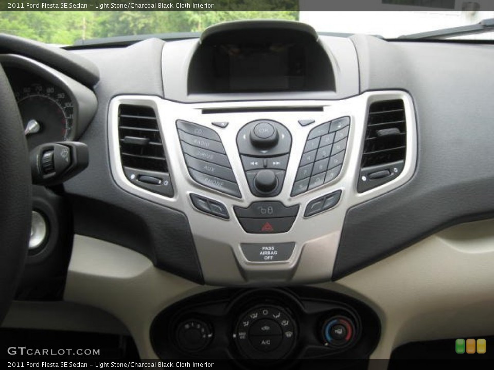 Light Stone/Charcoal Black Cloth Interior Controls for the 2011 Ford Fiesta SE Sedan #52114054
