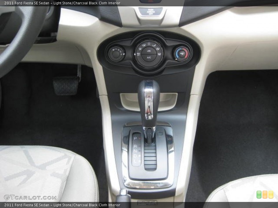 Light Stone/Charcoal Black Cloth Interior Transmission for the 2011 Ford Fiesta SE Sedan #52114069