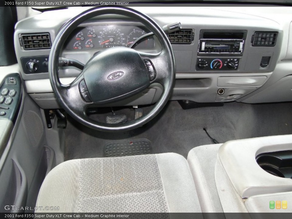 Medium Graphite Interior Dashboard for the 2001 Ford F350 Super Duty XLT Crew Cab #52119088