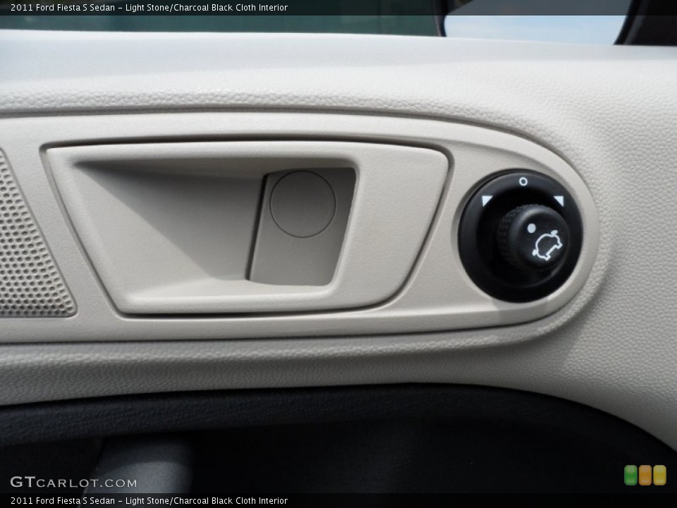 Light Stone/Charcoal Black Cloth Interior Controls for the 2011 Ford Fiesta S Sedan #52127920