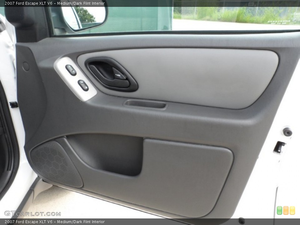 Medium/Dark Flint Interior Door Panel for the 2007 Ford Escape XLT V6 #52131091