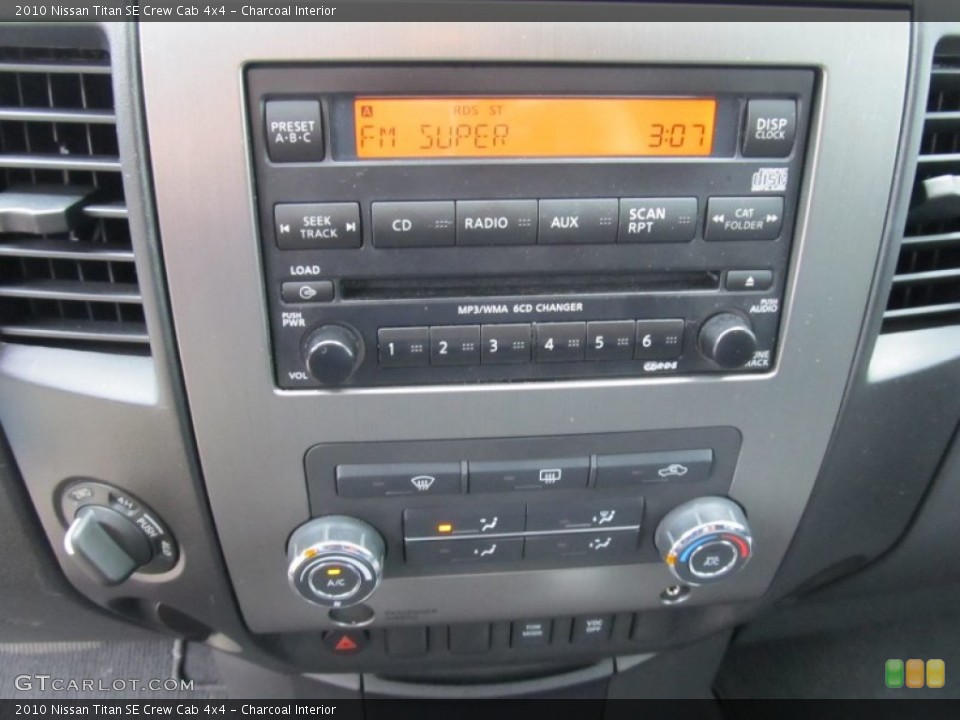 Charcoal Interior Controls for the 2010 Nissan Titan SE Crew Cab 4x4 #52135441