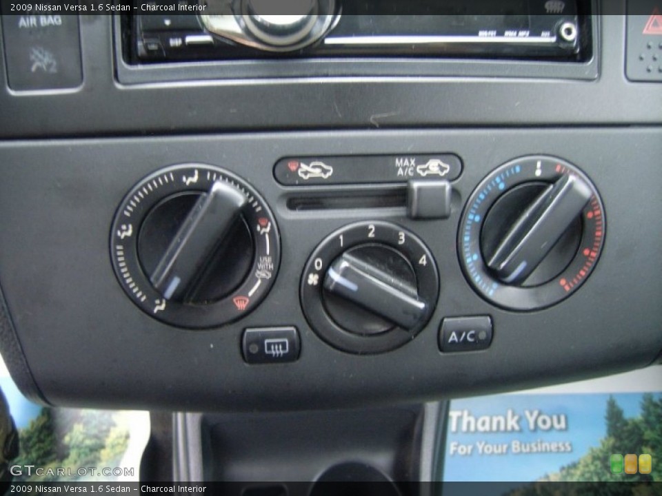 Charcoal Interior Controls for the 2009 Nissan Versa 1.6 Sedan #52147057