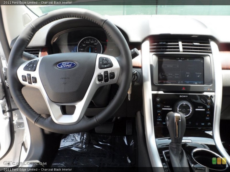 Charcoal Black Interior Dashboard for the 2011 Ford Edge Limited #52151346