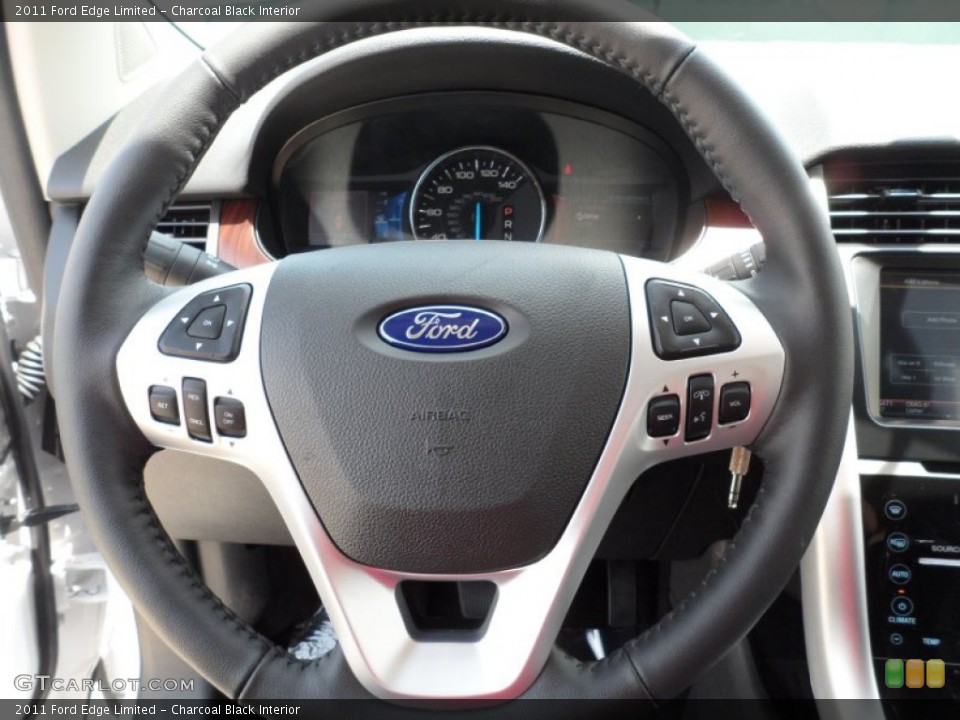 Charcoal Black Interior Steering Wheel for the 2011 Ford Edge Limited #52151436