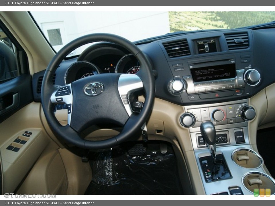Sand Beige Interior Dashboard for the 2011 Toyota Highlander SE 4WD #52167643