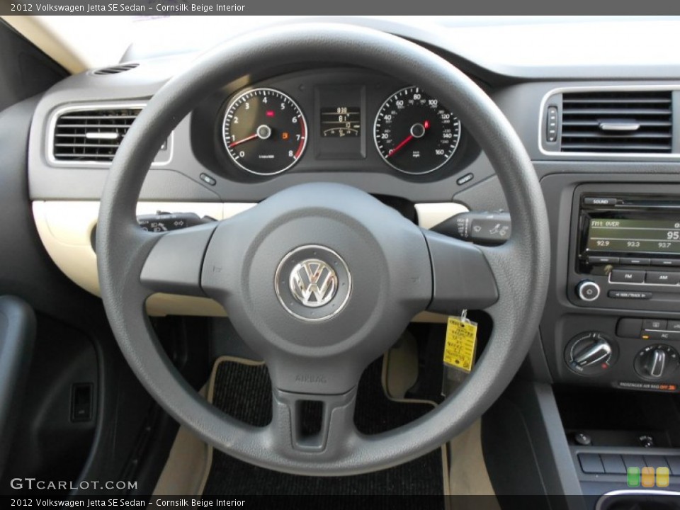 Cornsilk Beige Interior Steering Wheel for the 2012 Volkswagen Jetta SE Sedan #52177177