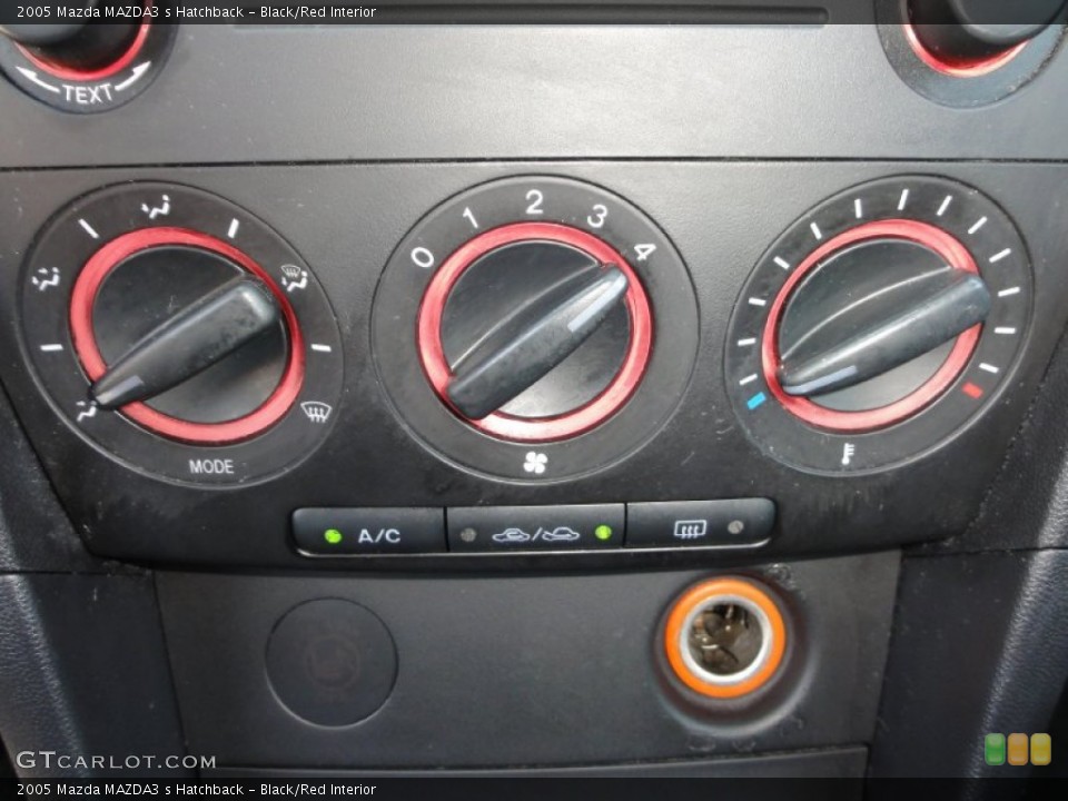 Black/Red Interior Controls for the 2005 Mazda MAZDA3 s Hatchback #52187314
