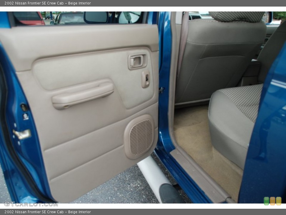 Beige Interior Door Panel for the 2002 Nissan Frontier SE Crew Cab #52198360
