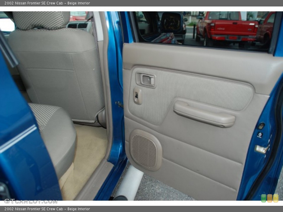 Beige Interior Door Panel for the 2002 Nissan Frontier SE Crew Cab #52198366