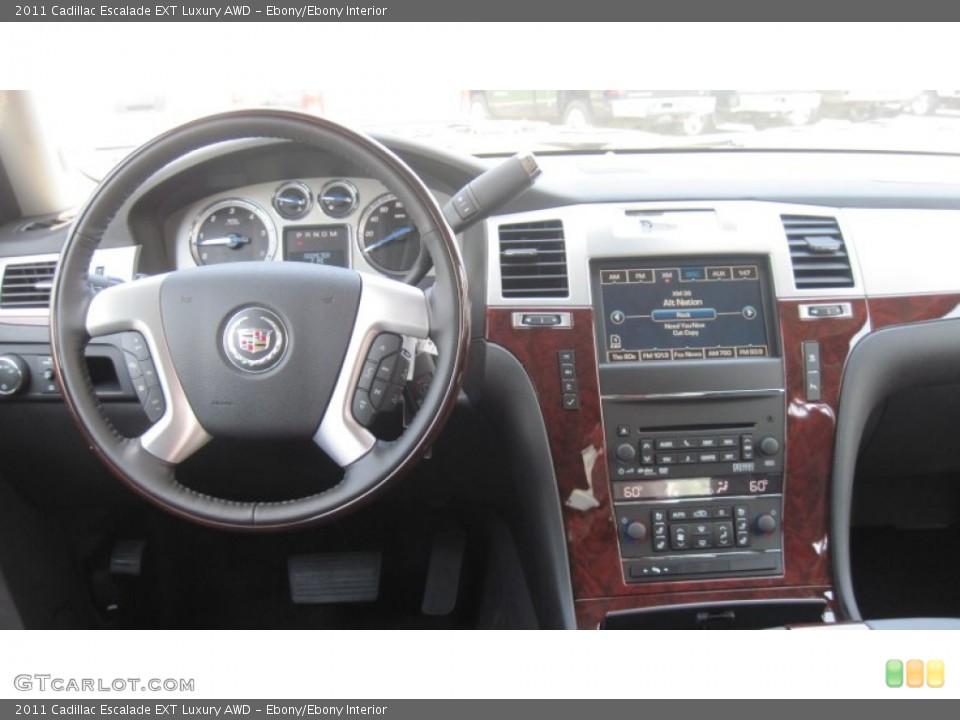 Ebony/Ebony Interior Dashboard for the 2011 Cadillac Escalade EXT Luxury AWD #52211749