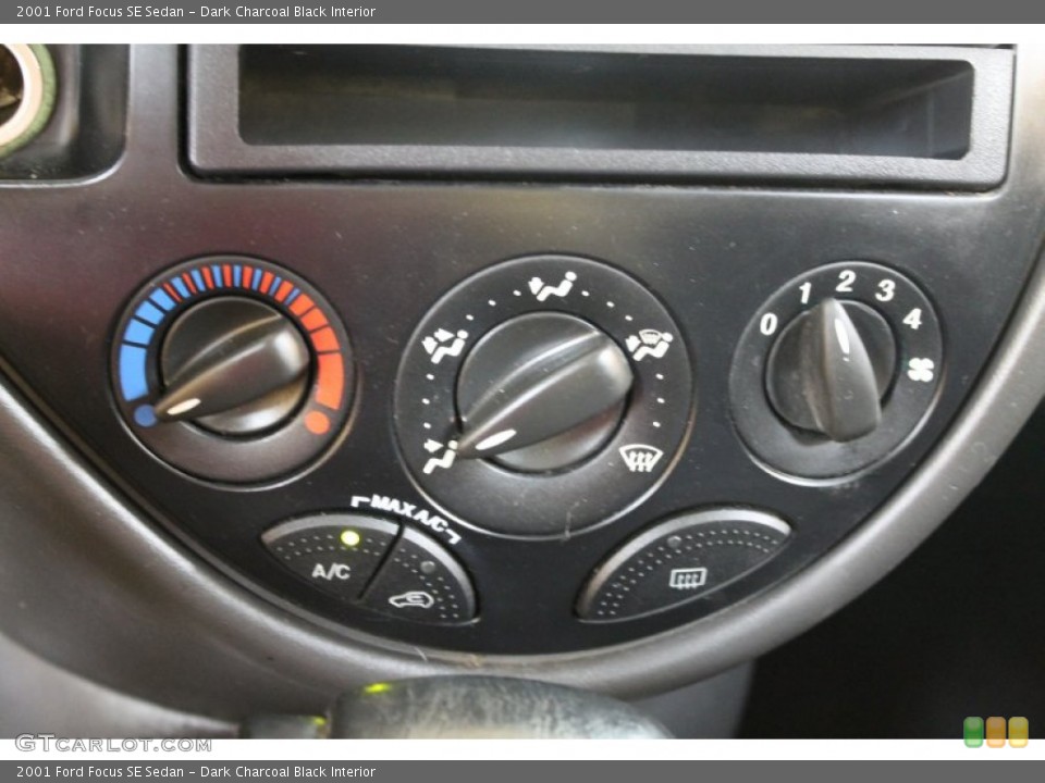 Dark Charcoal Black Interior Controls for the 2001 Ford Focus SE Sedan #52240483