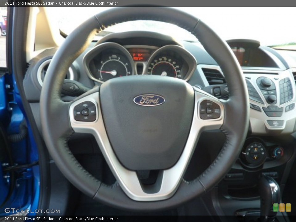 Charcoal Black/Blue Cloth Interior Steering Wheel for the 2011 Ford Fiesta SEL Sedan #52264219