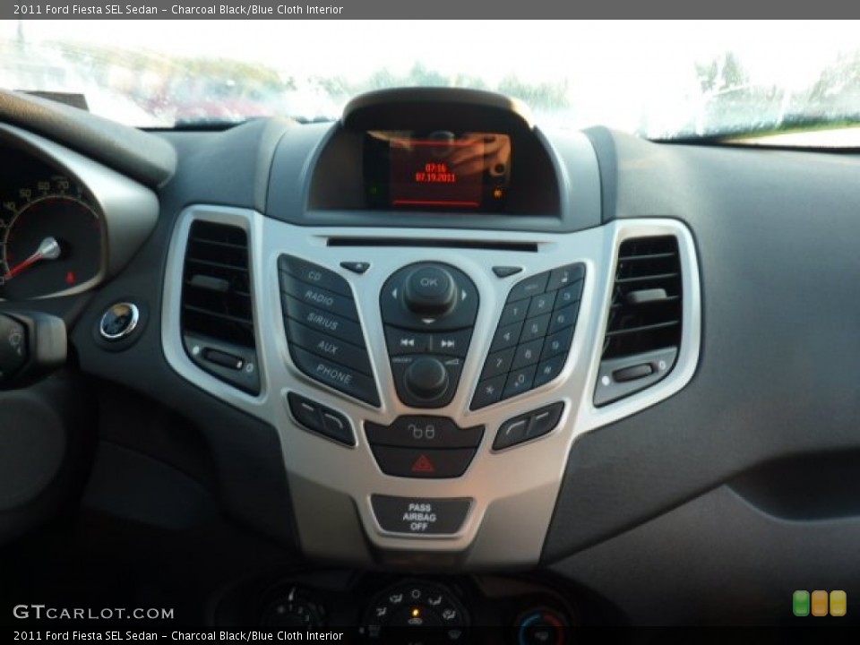 Charcoal Black/Blue Cloth Interior Controls for the 2011 Ford Fiesta SEL Sedan #52264258