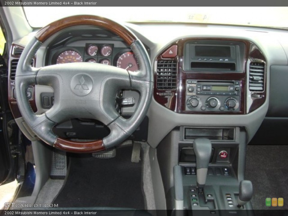 Black Interior Dashboard for the 2002 Mitsubishi Montero Limited 4x4 #52264939