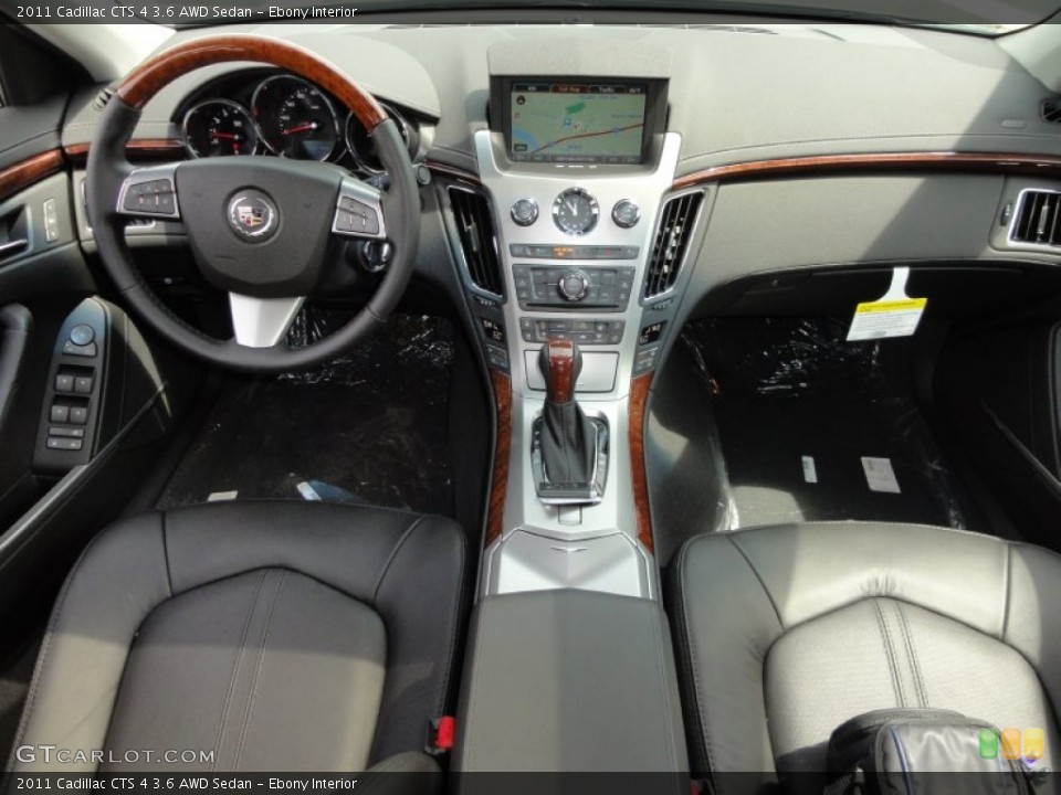 Ebony Interior Dashboard for the 2011 Cadillac CTS 4 3.6 AWD Sedan #52274440