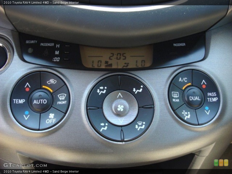 Sand Beige Interior Controls for the 2010 Toyota RAV4 Limited 4WD #52284467
