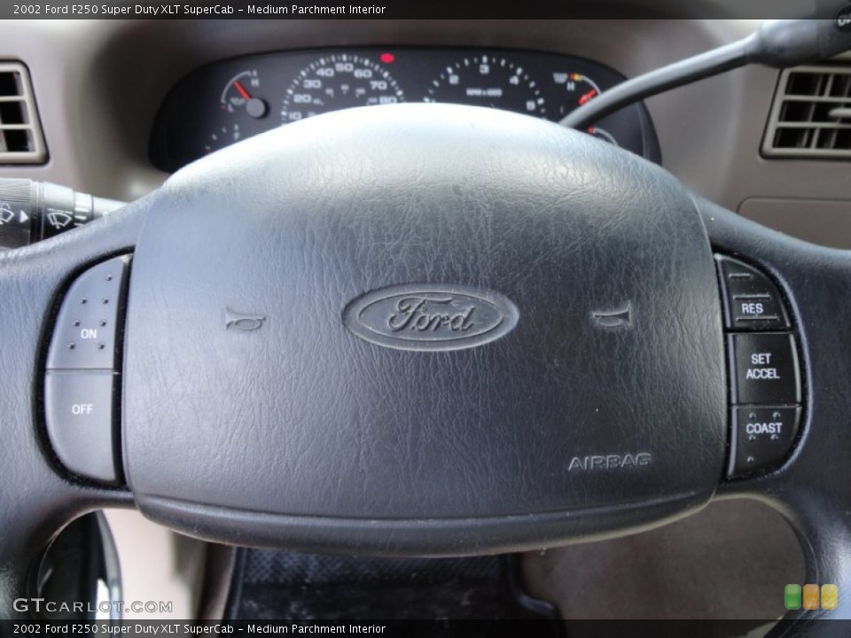Medium Parchment Interior Controls for the 2002 Ford F250 Super Duty XLT SuperCab #52315836