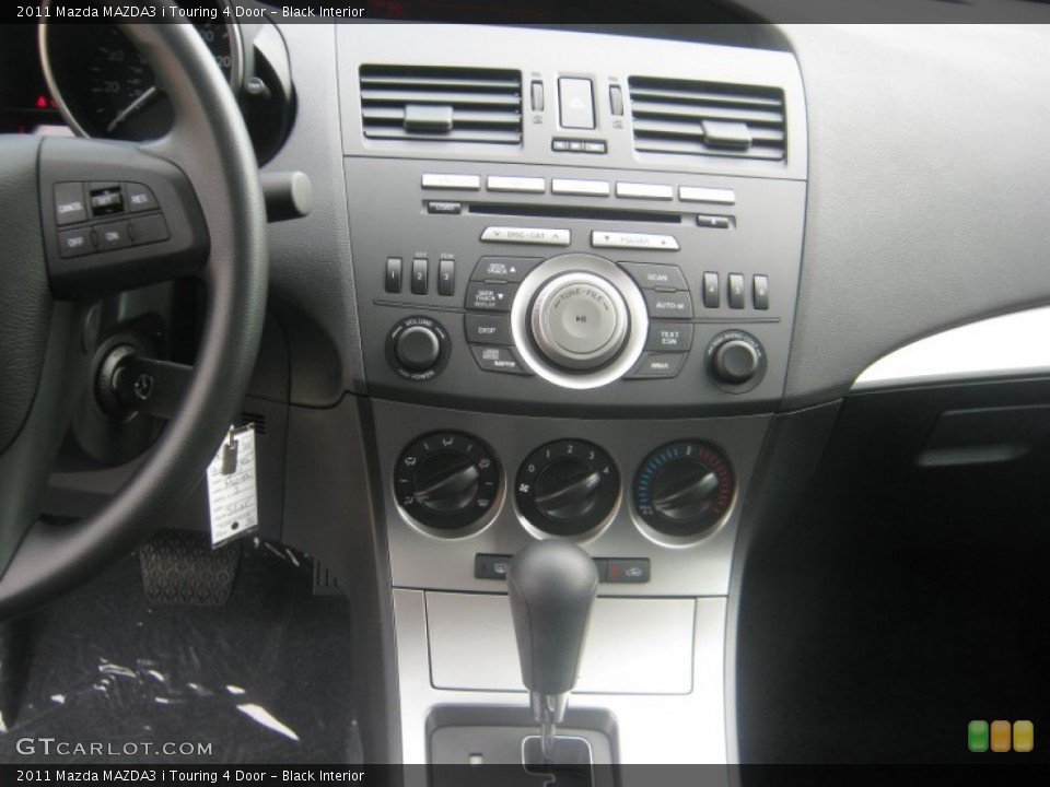 Black Interior Controls for the 2011 Mazda MAZDA3 i Touring 4 Door #52317891
