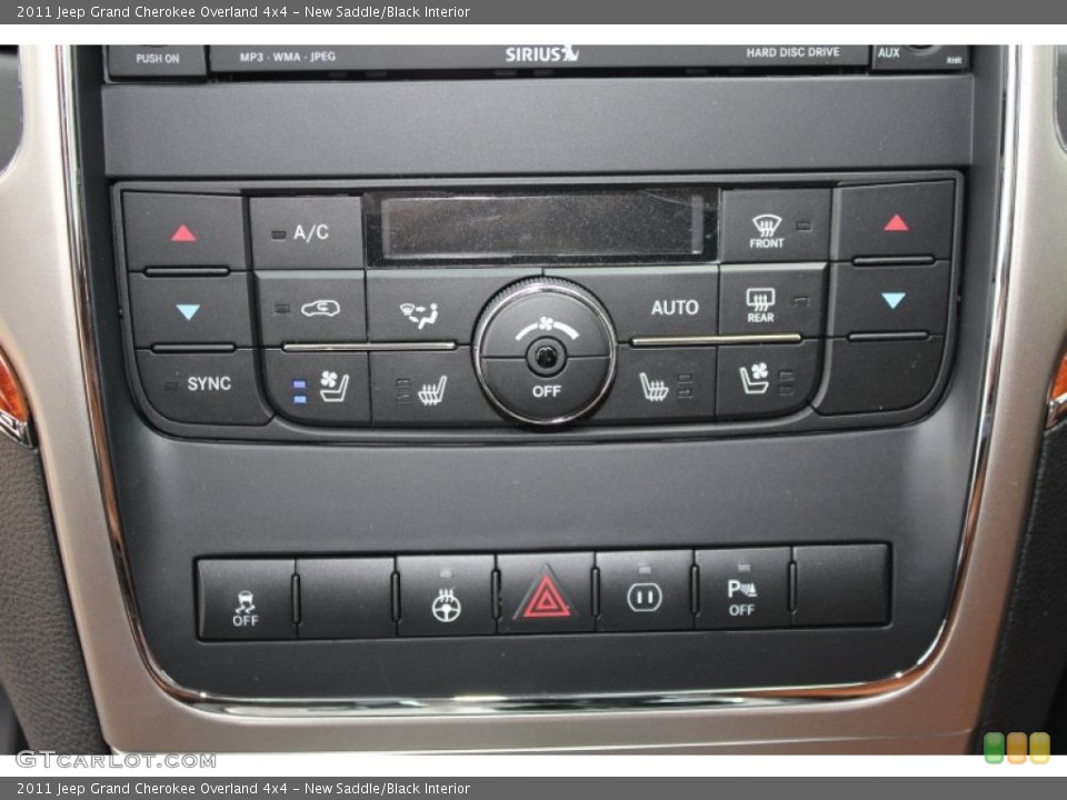New Saddle/Black Interior Controls for the 2011 Jeep Grand Cherokee Overland 4x4 #52340654