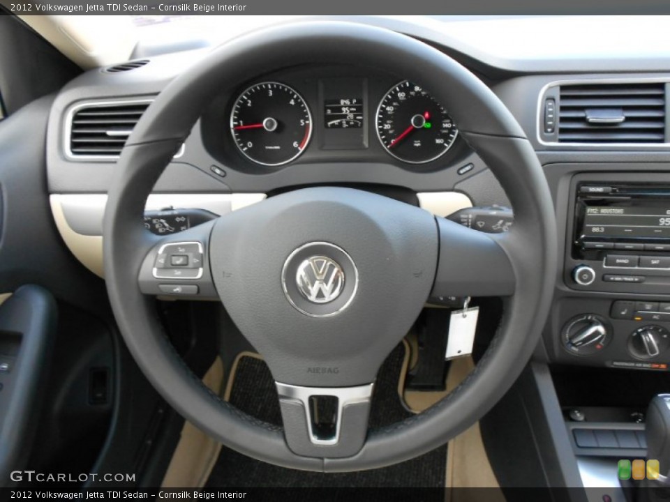 Cornsilk Beige Interior Steering Wheel for the 2012 Volkswagen Jetta TDI Sedan #52344699