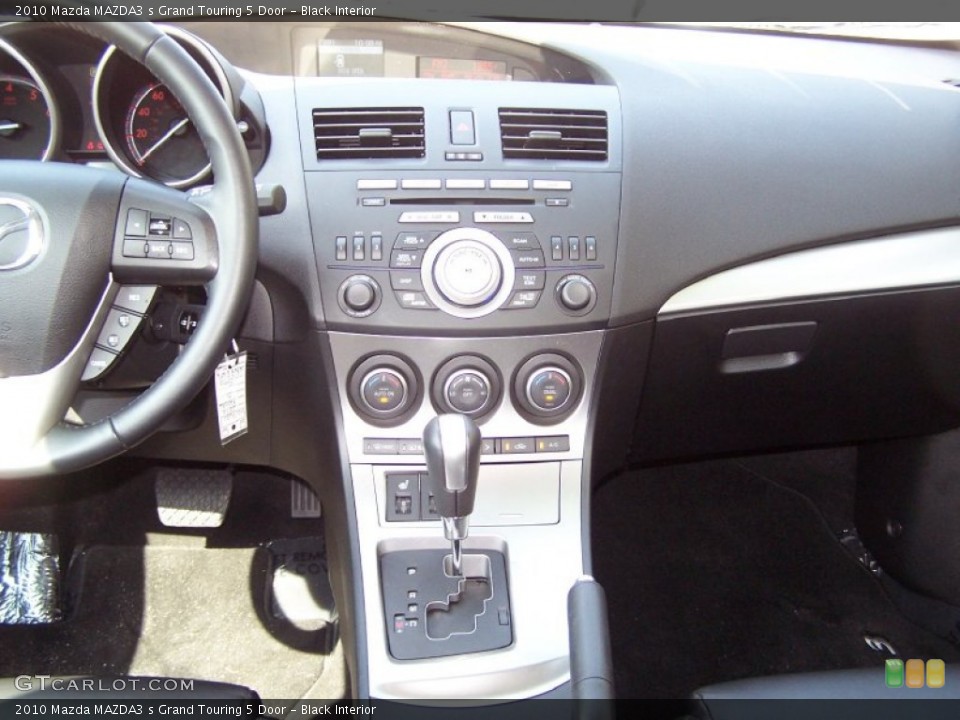 Black Interior Dashboard for the 2010 Mazda MAZDA3 s Grand Touring 5 Door #52363018