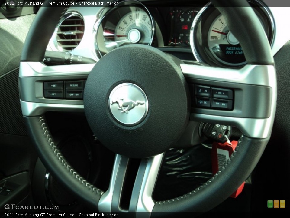 Charcoal Black Interior Steering Wheel for the 2011 Ford Mustang GT Premium Coupe #52368373