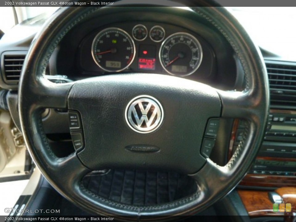 Black Interior Steering Wheel for the 2002 Volkswagen Passat GLX 4Motion Wagon #52388533