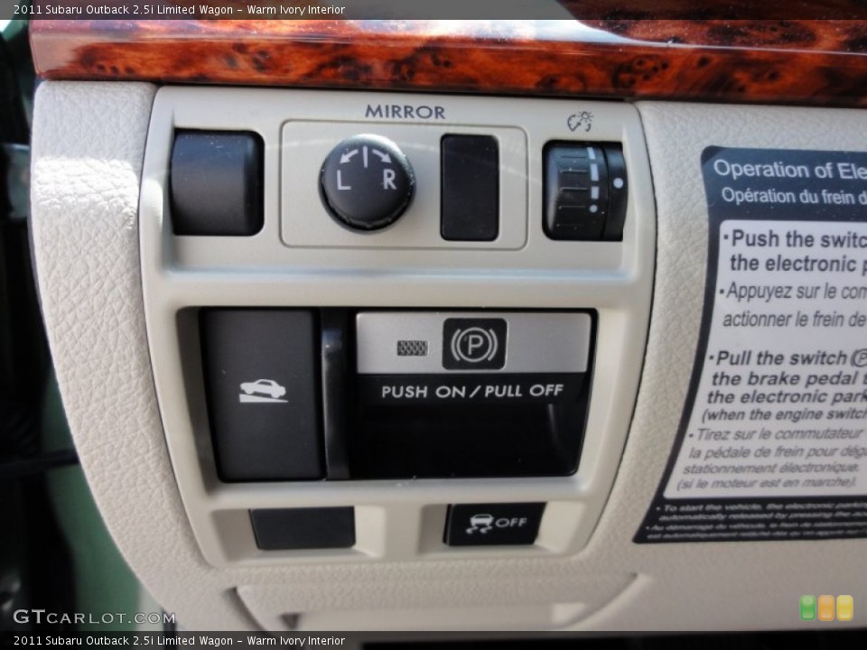 Warm Ivory Interior Controls for the 2011 Subaru Outback 2.5i Limited Wagon #52394514