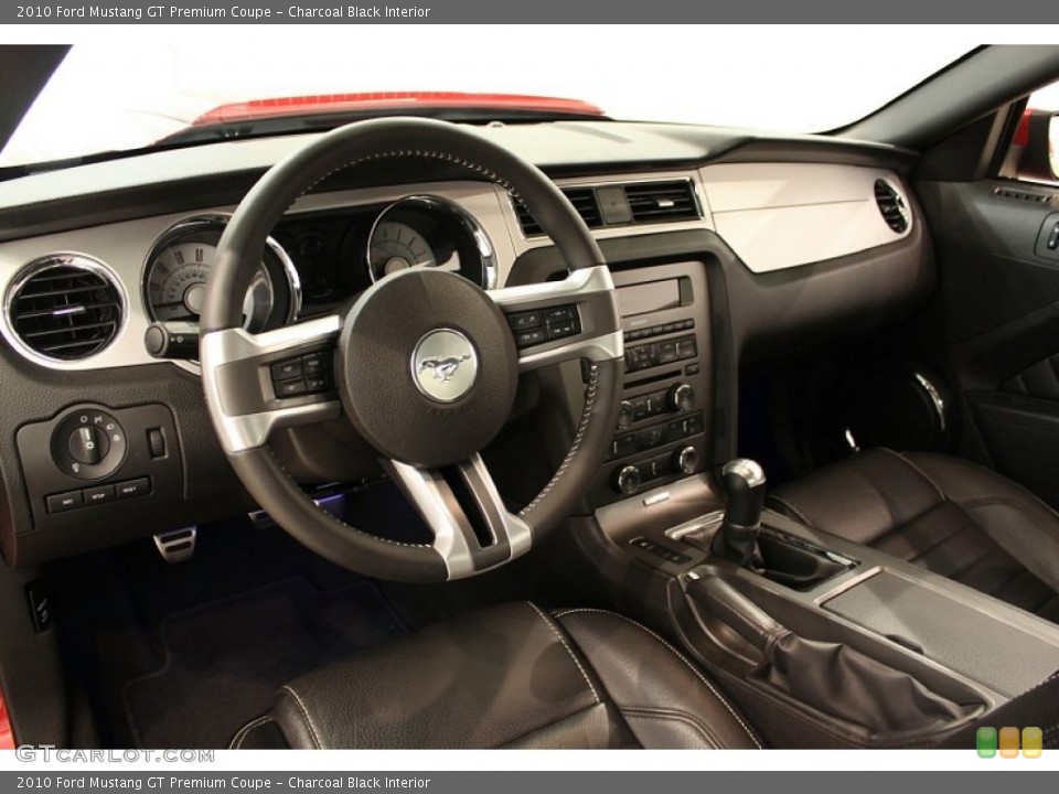 Charcoal Black Interior Dashboard for the 2010 Ford Mustang GT Premium Coupe #52400376