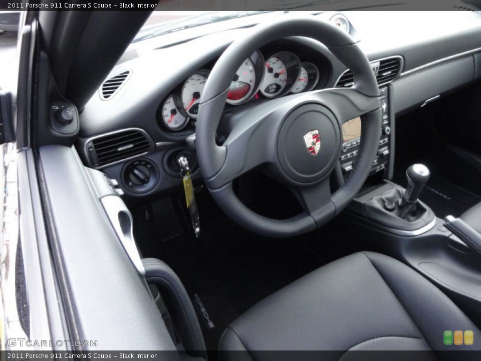 Black Interior Steering Wheel for the 2011 Porsche 911 Carrera S Coupe #52405233