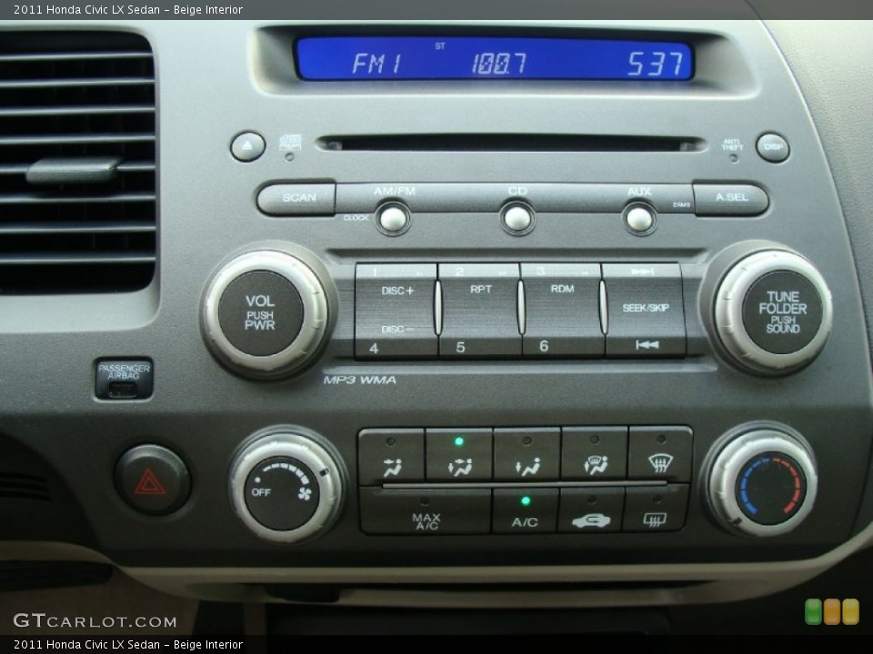 Beige Interior Controls for the 2011 Honda Civic LX Sedan #52405410