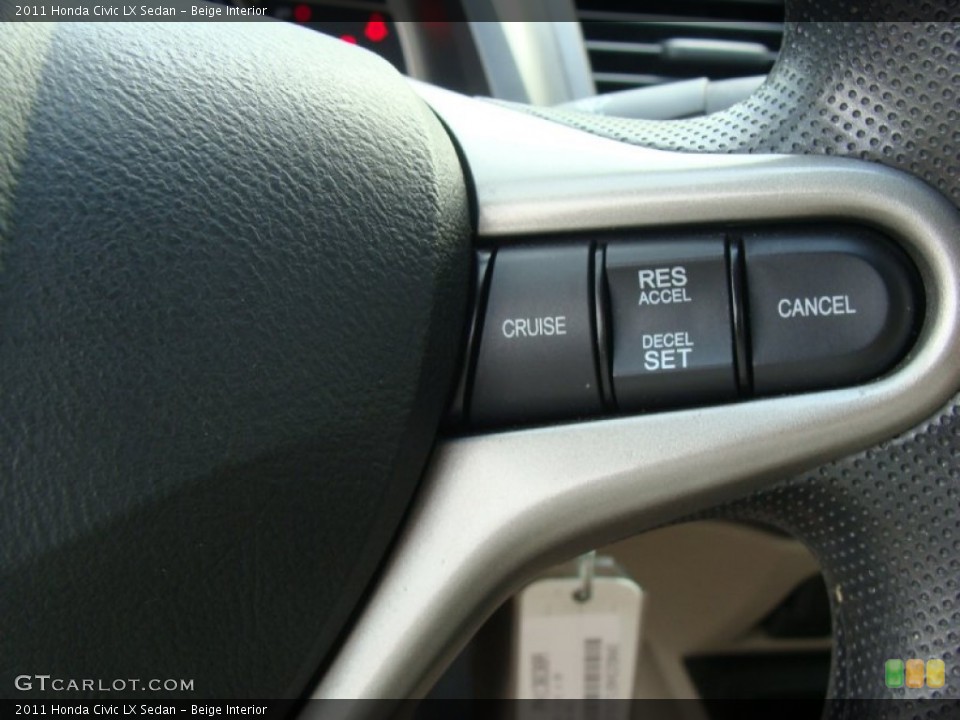Beige Interior Controls for the 2011 Honda Civic LX Sedan #52405437