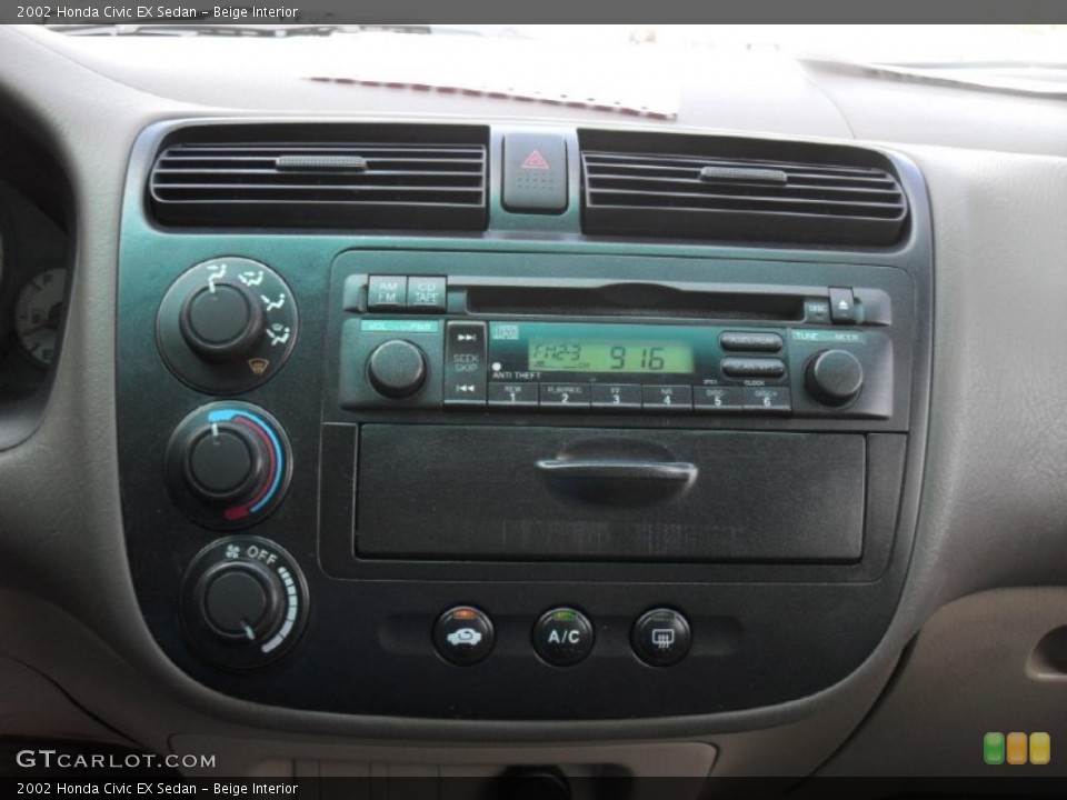 Beige Interior Controls for the 2002 Honda Civic EX Sedan #52405842