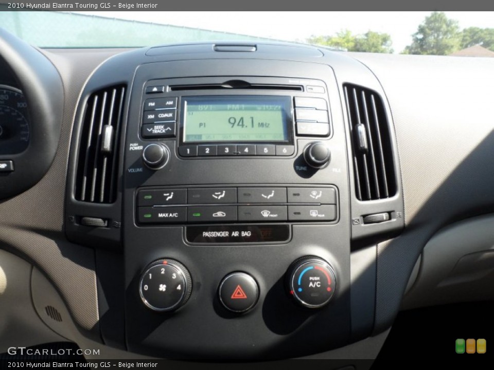 Beige Interior Controls for the 2010 Hyundai Elantra Touring GLS #52425534