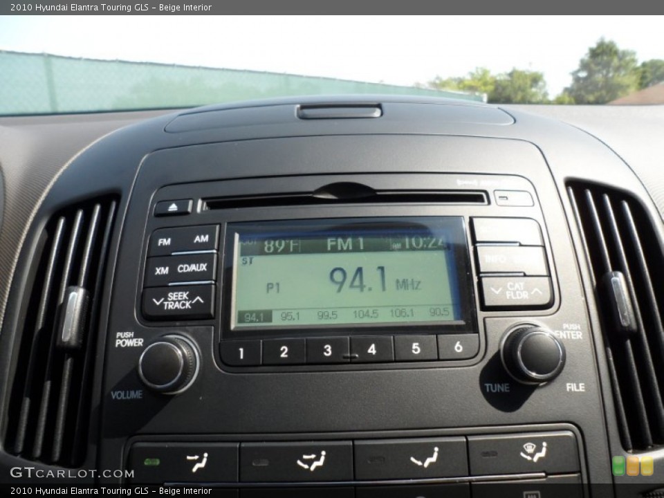 Beige Interior Controls for the 2010 Hyundai Elantra Touring GLS #52425543