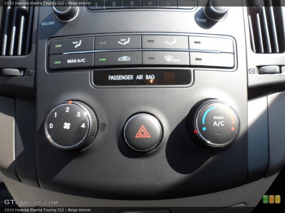 Beige Interior Controls for the 2010 Hyundai Elantra Touring GLS #52425549