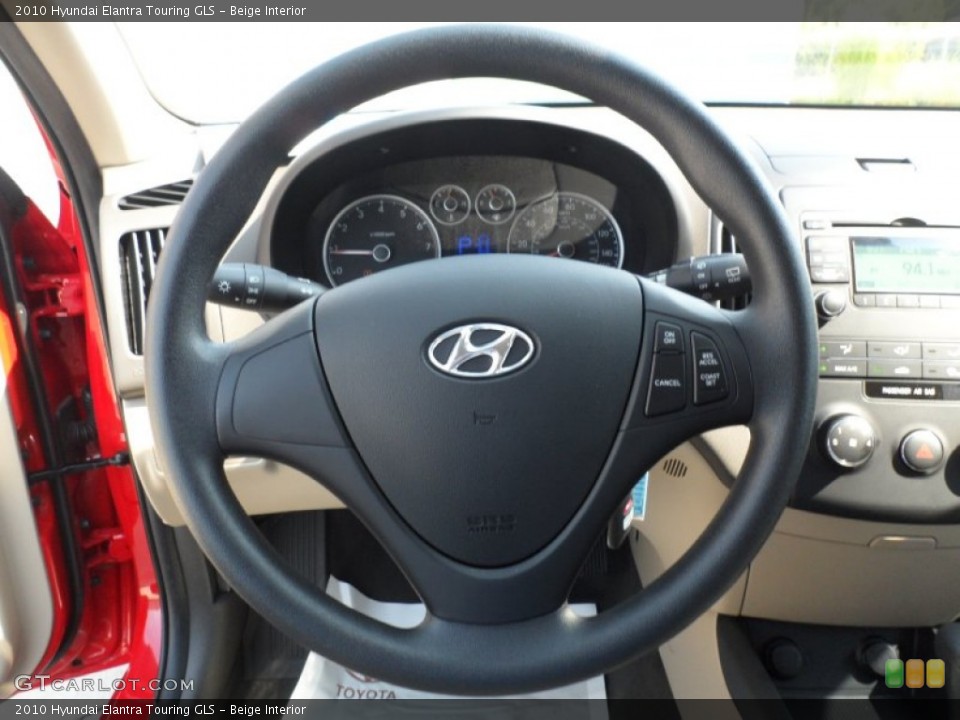 Beige Interior Steering Wheel for the 2010 Hyundai Elantra Touring GLS #52425567