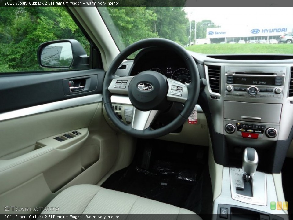 Warm Ivory Interior Dashboard for the 2011 Subaru Outback 2.5i Premium Wagon #52437096