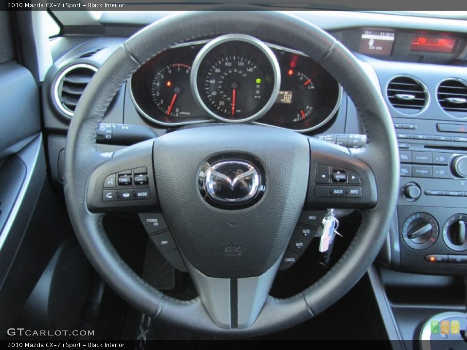 Black Interior Steering Wheel for the 2010 Mazda CX-7 i Sport #52449757